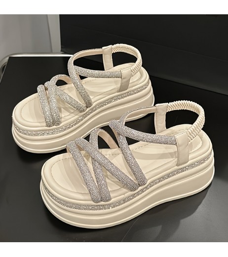 夏の女性用新しいスタイリッシュで多用途なローマサンダル。厚底で身長をアップさせ、カジュアルな着こなしに最適です。の新しい爆発的な夏スタイルの女性用ローマサンダルは、厚底と水のドリル装飾が特徴です。