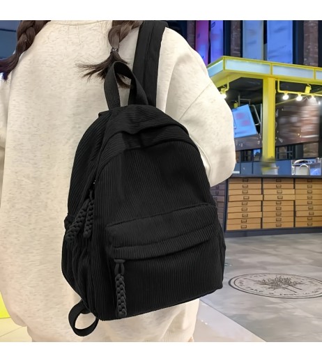 女性用メディアムコーデュロイバックパック - ブラック、調節可能なストラップ、フロントジッパーポケット付き折りたたみ式デザイン、タッセルアクセント付き、旅行、学校、または日常使用に適したカジュアルデイパック、旅行用バックパック