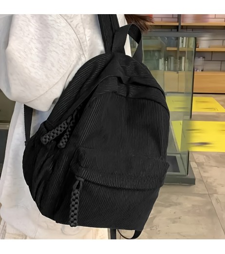 女性用メディアムコーデュロイバックパック - ブラック、調節可能なストラップ、フロントジッパーポケット付き折りたたみ式デザイン、タッセルアクセント付き、旅行、学校、または日常使用に適したカジュアルデイパック、旅行用バックパック