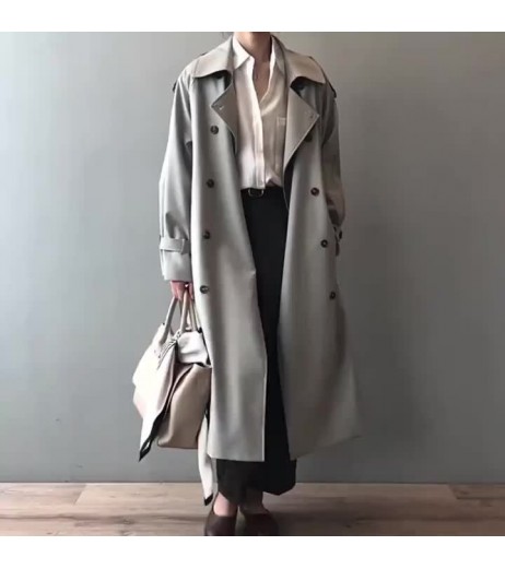 秋の新しい韓国版のトレンチコート、女性用の長いトレンチコート、気性のあるルーズウエストのスリムカジュアルコート